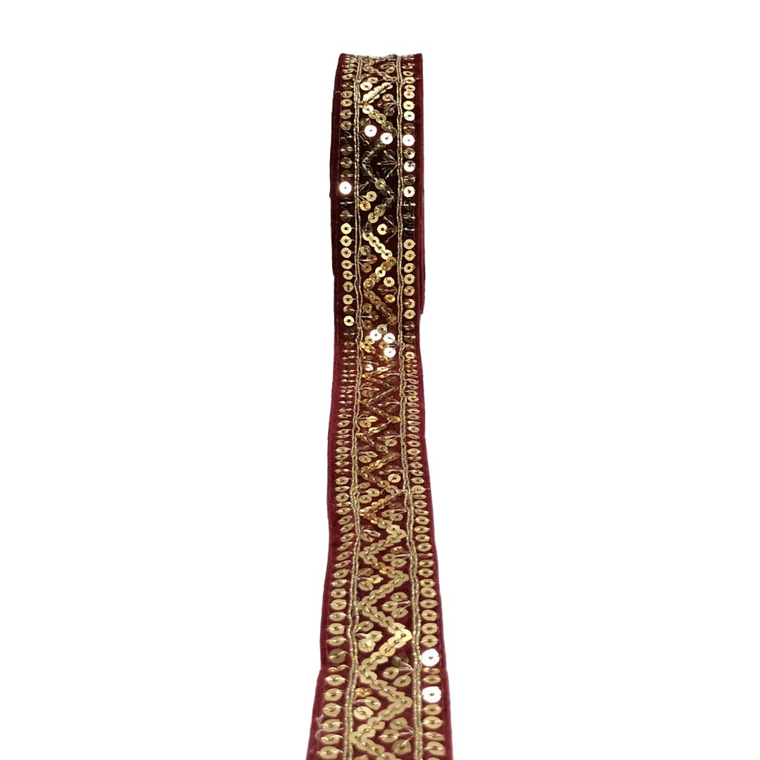 Decorative ribbon with gold pattern on a white background